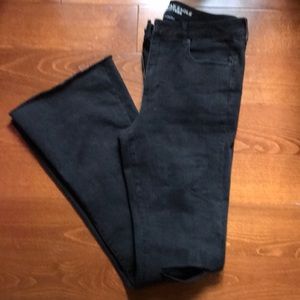 AE super stretch high rise slim flare size 14 X-long. With knee tears. Black.